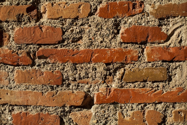 Close-up of brick wall with cement