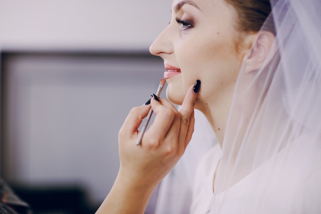 Close-up of bride preparing for her day