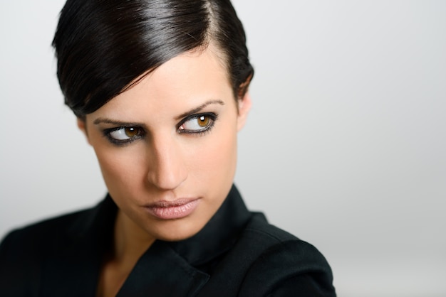 Close-up of brunette woman with intense look 