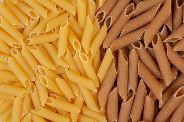 Free photo close up bunch of colorful raw pasta.