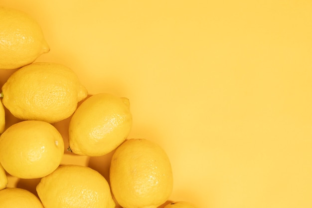 Close-up bunch of lemons with copy space
