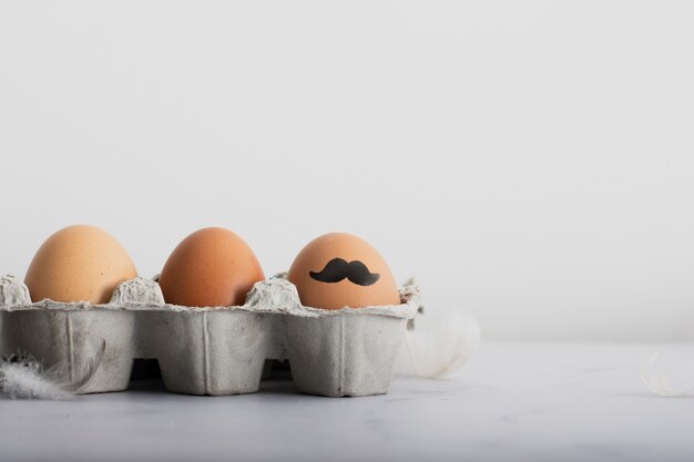 Close-up bunch of organic eggs with painting