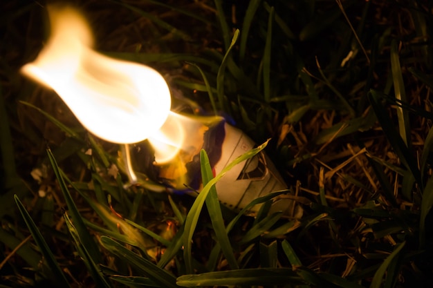 Close up of burning paper airplane model