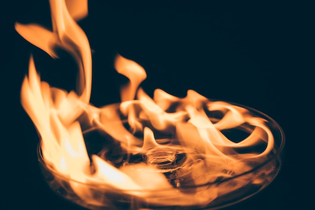 Close-up of burning tequila shot glass