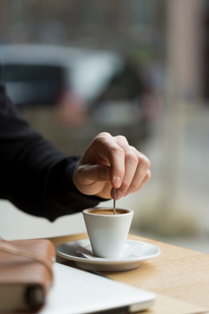 close-up business man enjoying coffee