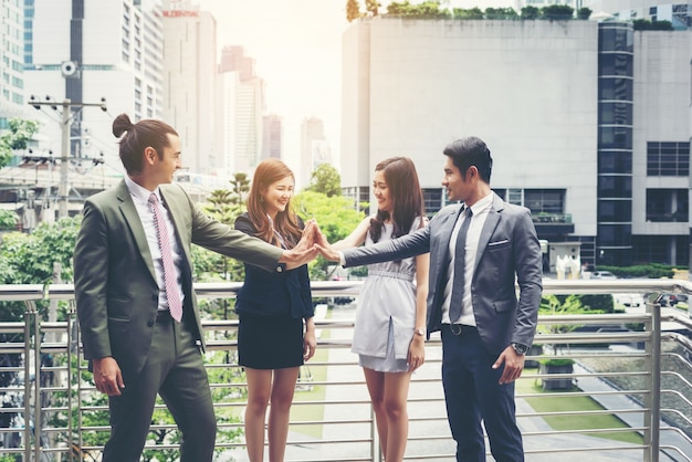 Close up of business people hands together. Teamwork concept.