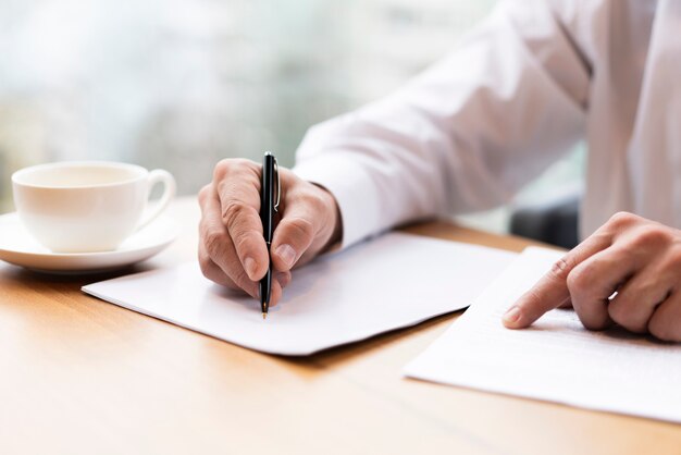 Close-up businessman ready to sign contract