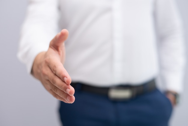 Free photo close-up of businessman stretching hand for handshake