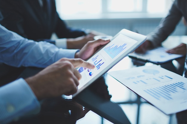 Free Photo close-up of businessman with digital tablet
