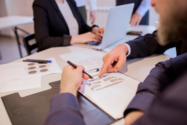 Free photo close-up of businesspeople hands during discussion of business plan