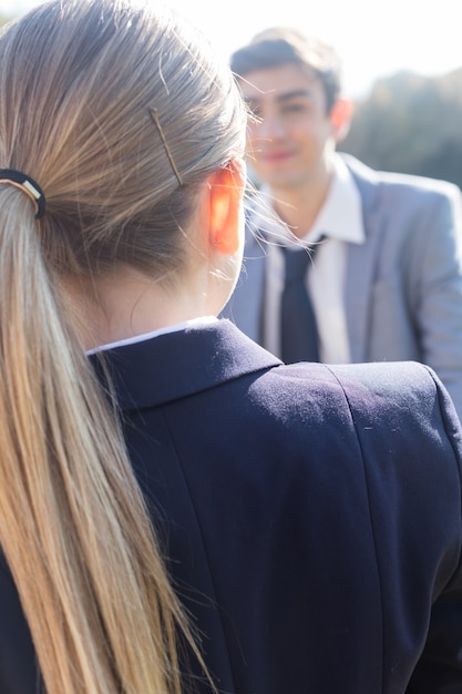 Close-up of businesswoman's back with a ponytail