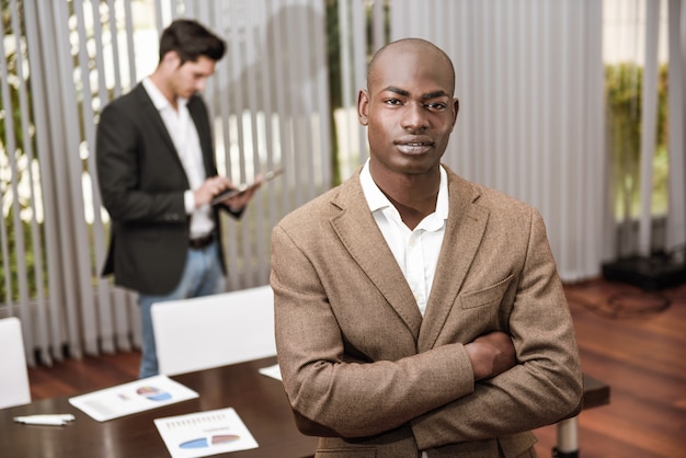 Close-up of calm businessman calm with crossed arms