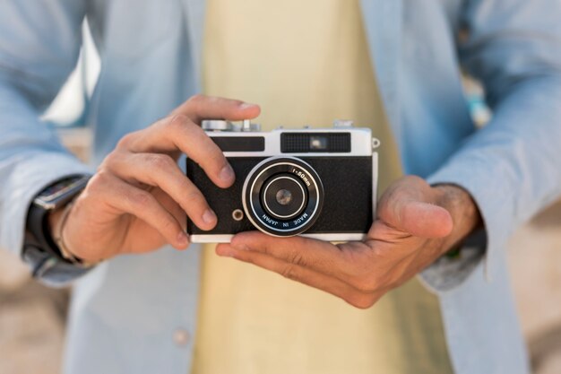 Close-up camera held by person