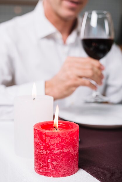 Close-up of candle during romantic dinner