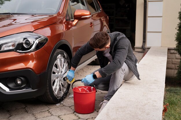 Close up on car care process