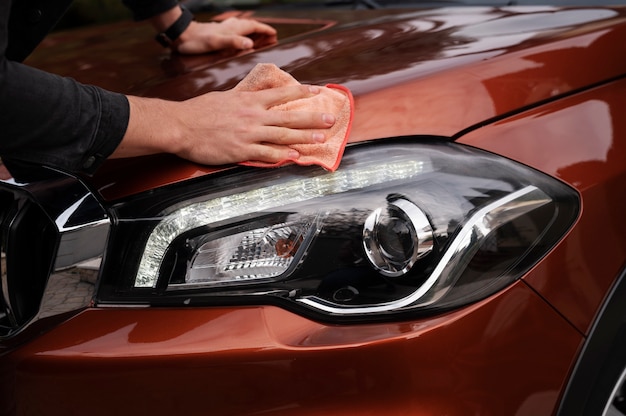 Close up on car care process