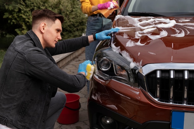 Close up on car care process