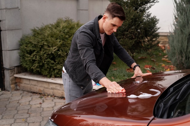 Close up on car care process