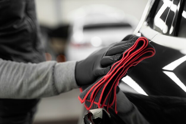 Close up on car care process