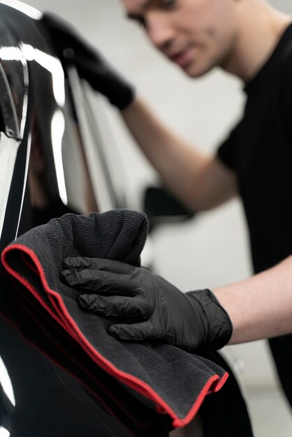 Close up on car care process