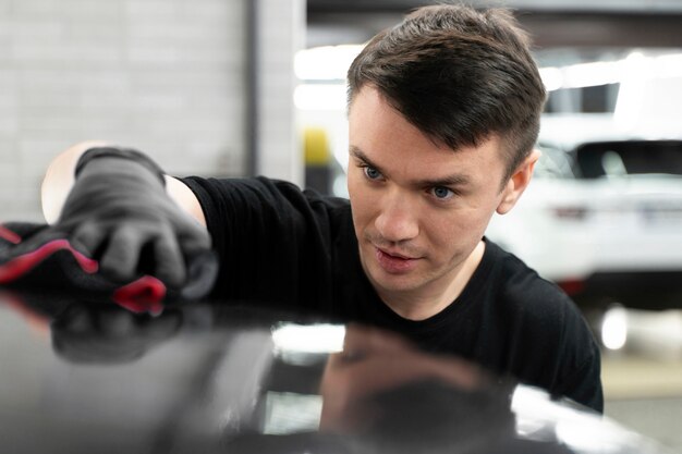 Close up on car care process