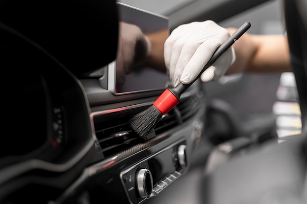 Close up on car care process