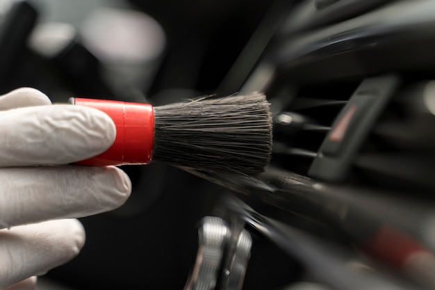 Close up on car care process