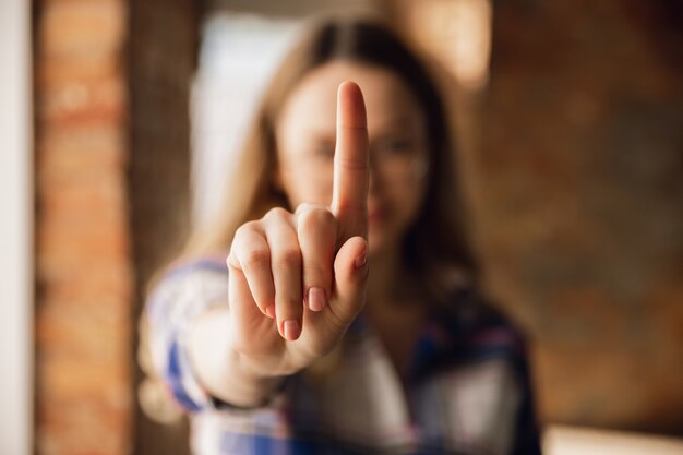 Close up of caucasian female hands during working in office, studying, top view