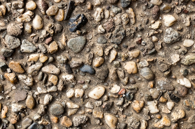 Close-up of cement with stones