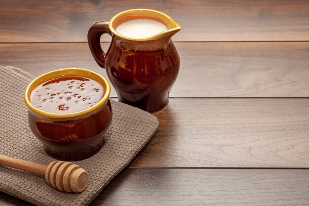 Close-up ceramic bowl filled with honey