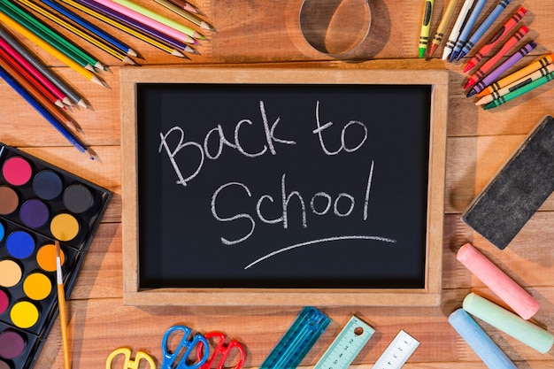 Free photo close-up of chalkboard with stationery