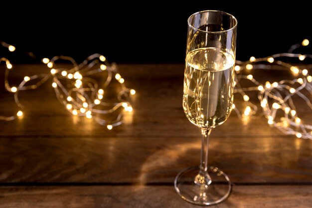 Close-up champagne bottle on table