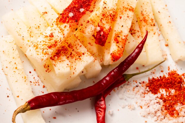 Close-up cheese with chili peppers