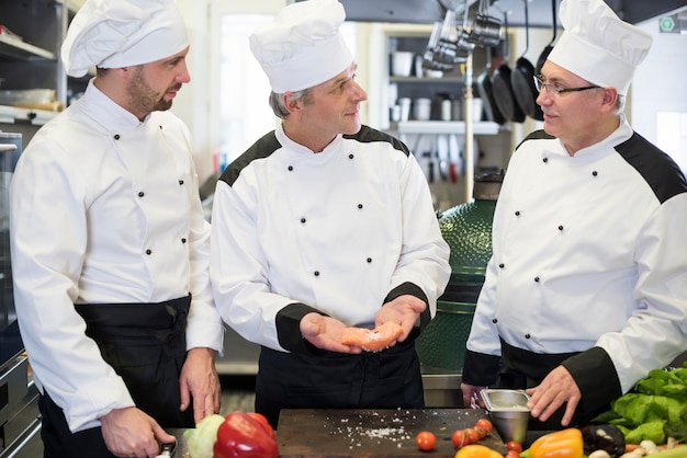 Close up on chef cooking in restaurant kitchen