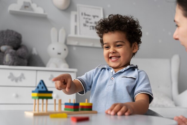 Close up on child enjoying didactic game