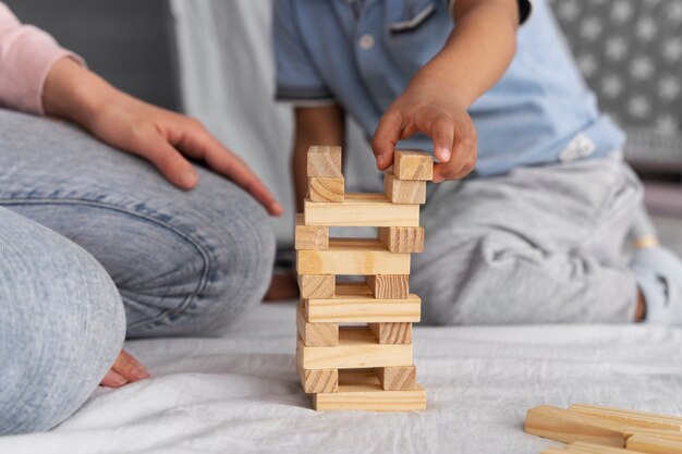 Close up on child enjoying didactic game