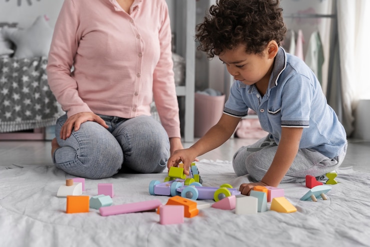Free Photo close up on child enjoying didactic game