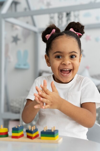 Close up on child enjoying didactic game