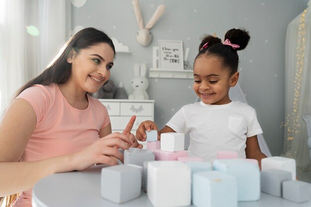 Close up on child enjoying didactic game