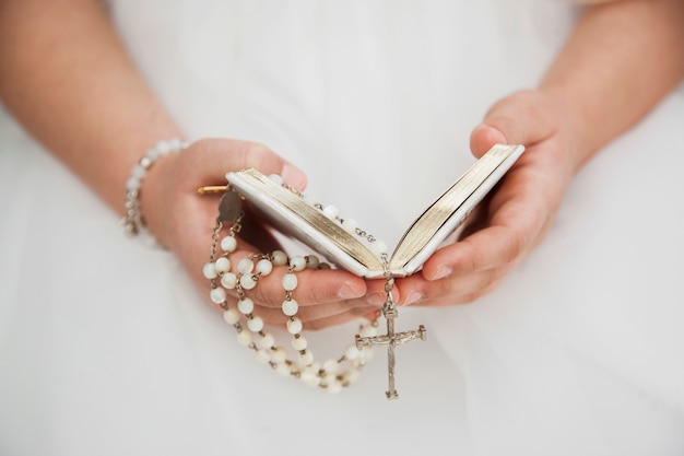 Close up on child hands  during holy communion