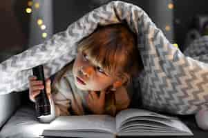 Free photo close up on child playing in her room