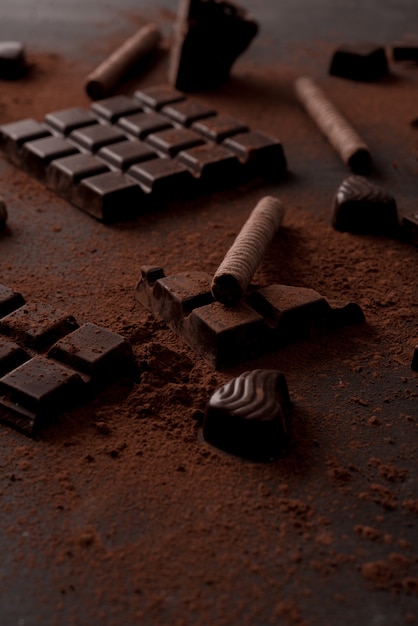 Free photo close up of chocolate bar crashed into pieces