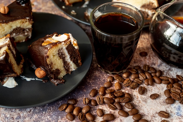 Close-up chocolate cake with coffee