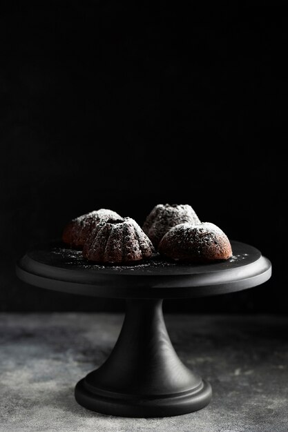 close-up chocolate dessert with sugar powder