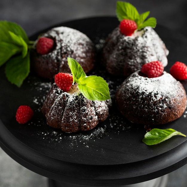 close-up chocolate dessert with sugar powder