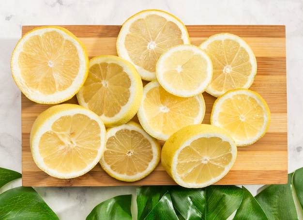 Close-up chopping board with lemons