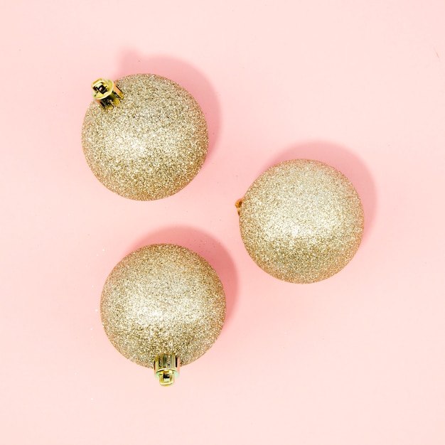 Close-up christmas balls with pink background