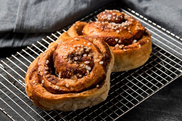 Close-up cinnamon rolls on table