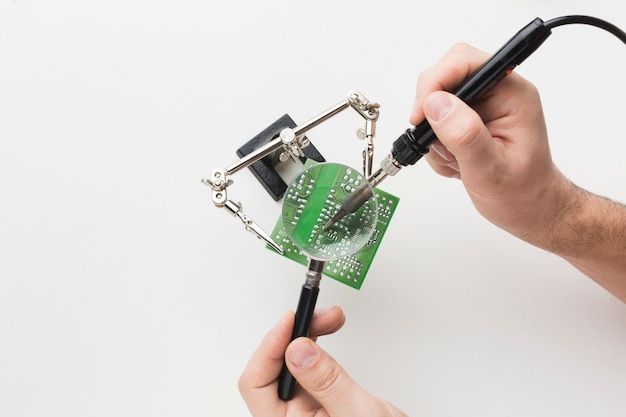 Close-up circuit board repair