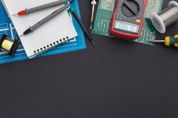 Close-up circuit board with multimeter